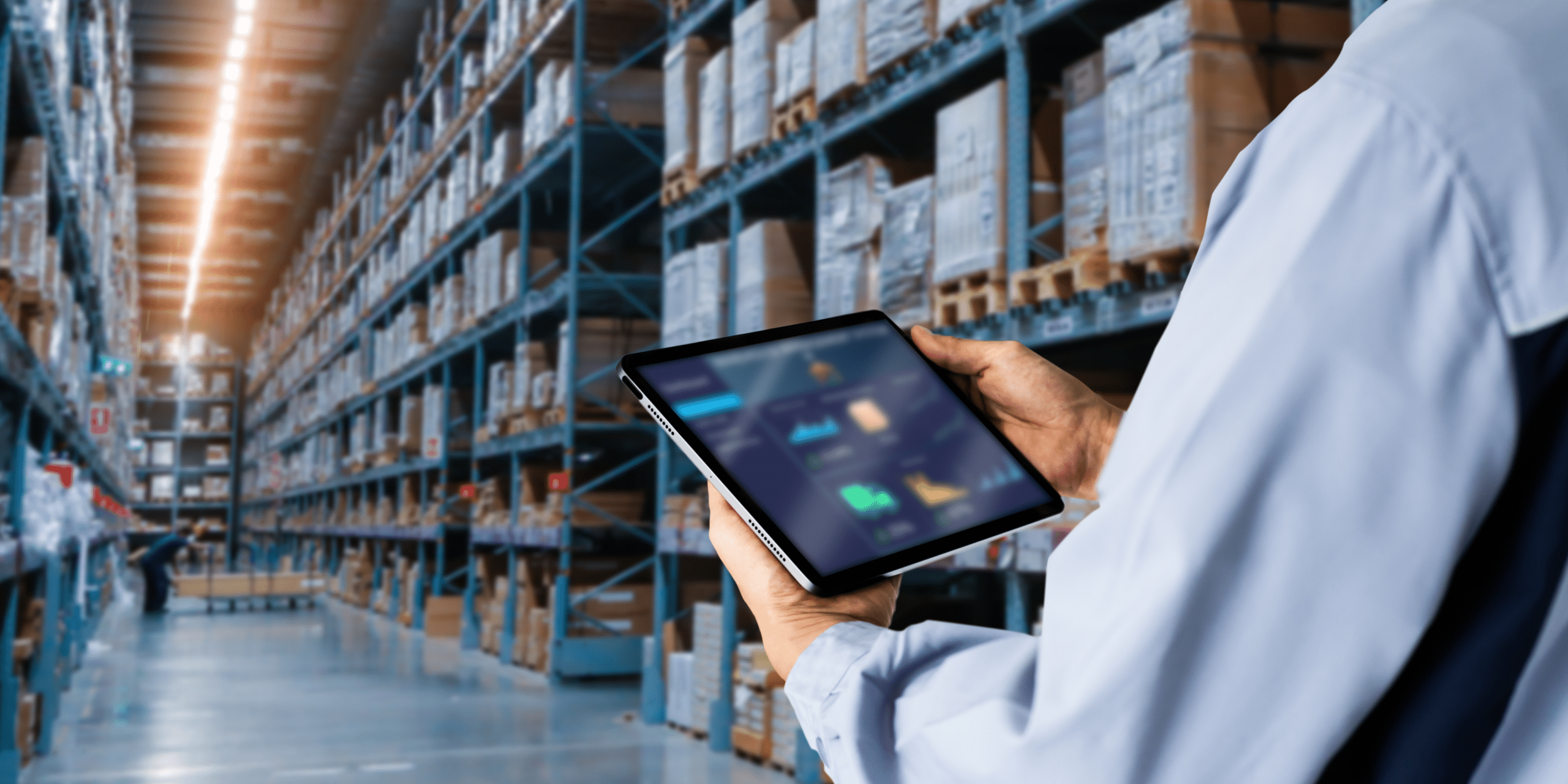 worker on tablet in warehouse