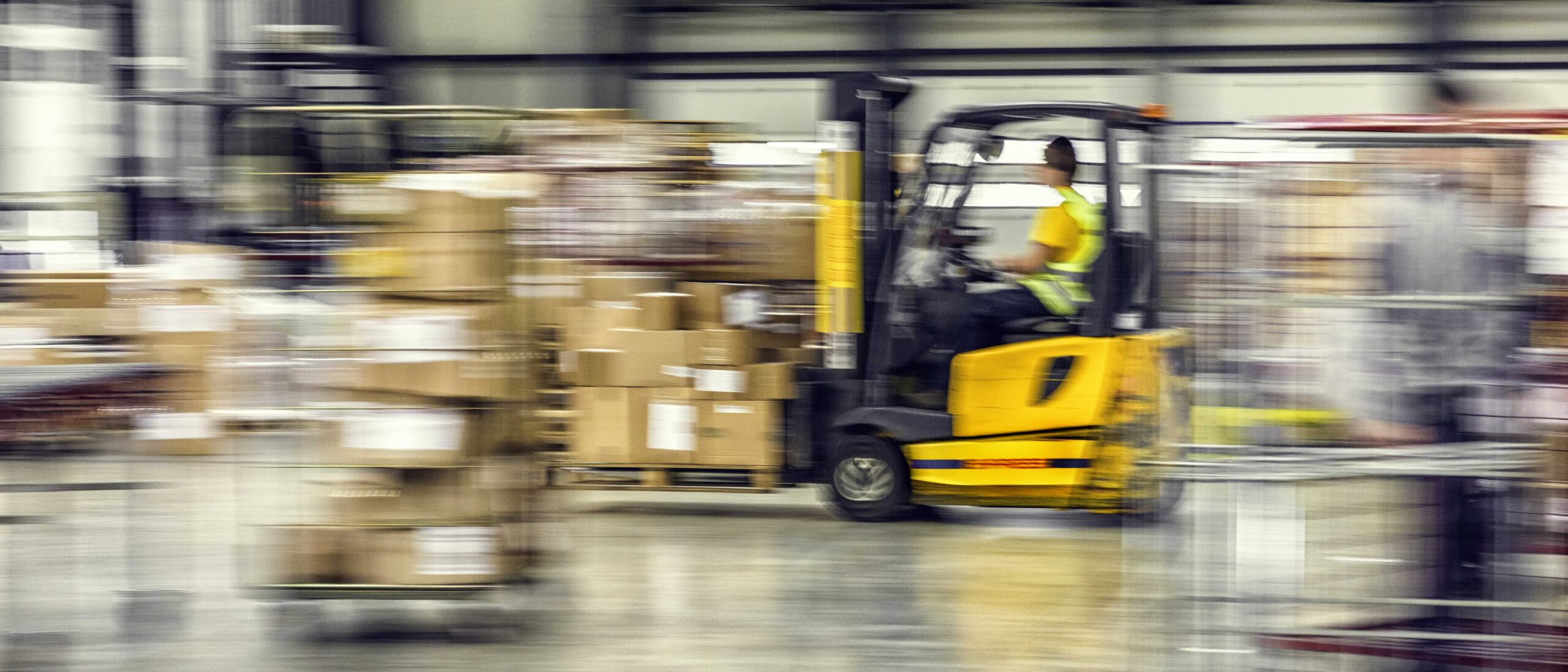 forklift moving in warehouse