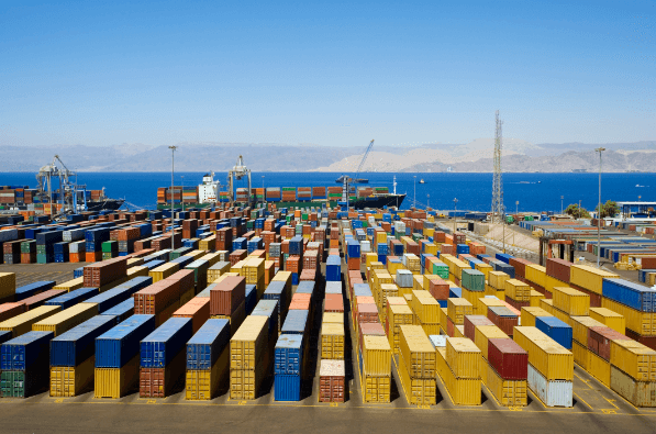 shipping containers sitting at the port