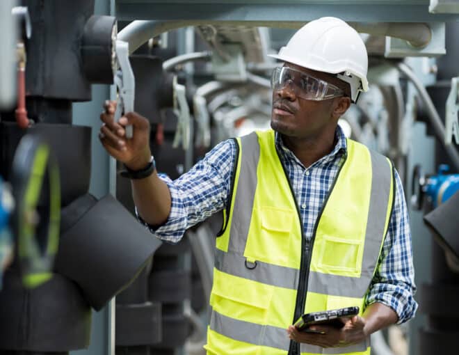 Capstone rep inspecting in a industrial warehouse