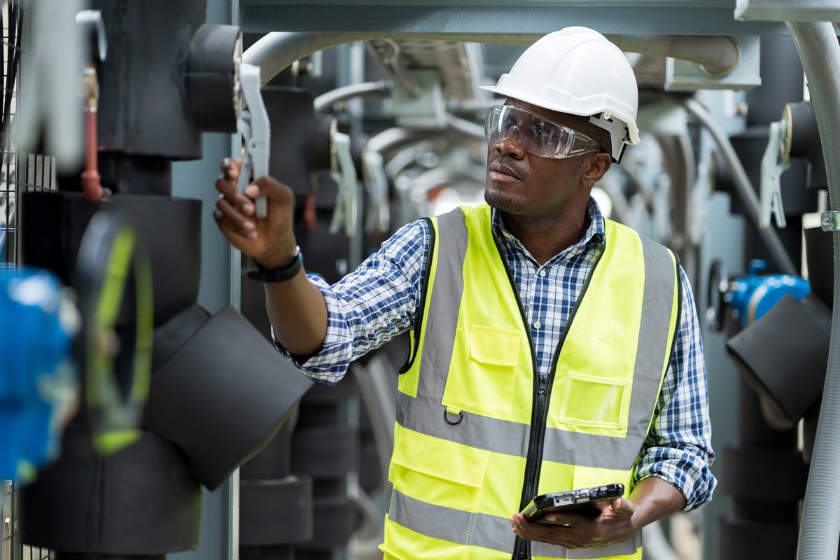 Capstone rep inspecting in a industrial warehouse