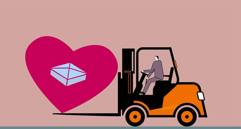 forklift moving a heart with a capstone watermark in a heart